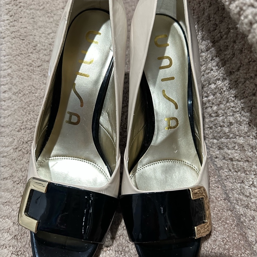 Never worn, scratch on the side